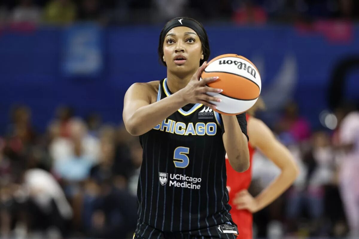 Aug 30, 2024; Chicago, Illinois, USA; Chicago Sky forward Angel Reese (5) shoots a free throw against the Indiana Fever during the second half at Wintrust Arena. Mandatory Credit: Kamil Krzaczynski-USA TODAY Sports