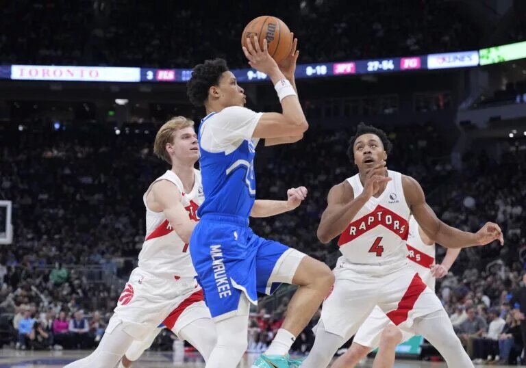 The Bucks converted Ryan Rollins to a standard deal.