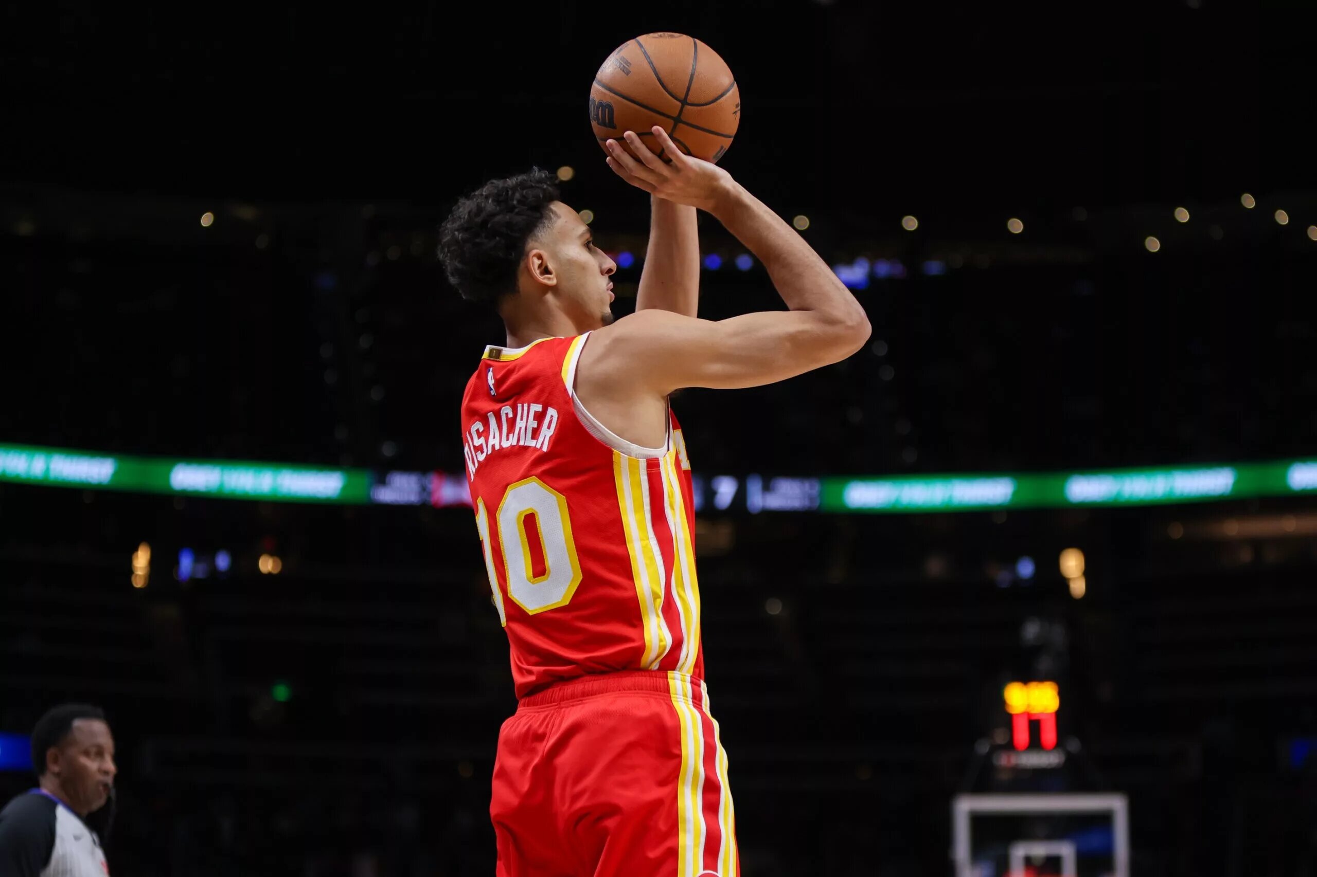 Atlanta Hawks forward Zaccharie Risacher (10) shoots against the San Antonio Spurs in the first quarter at State Farm Arena.