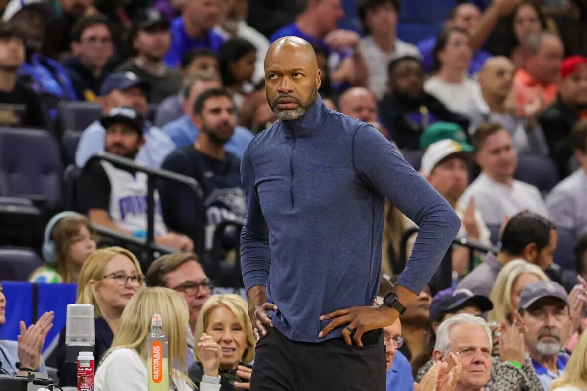Feb 23, 2025; Orlando, Florida, USA; Orlando Magic head coach Jamahl Mosley looks at the clock during the second quarter against the Washington Wizards at Kia Center. Mandatory Credit: Mike Watters-Imagn Images