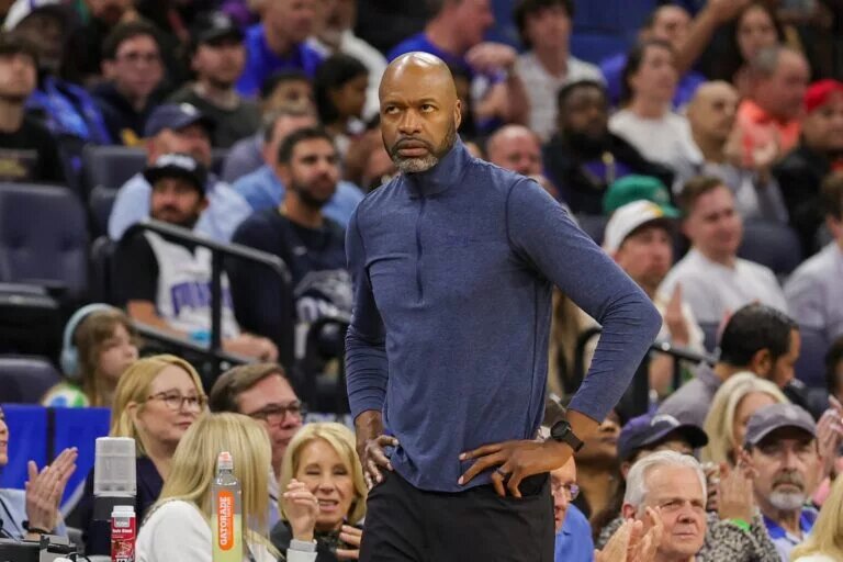Feb 23, 2025; Orlando, Florida, USA; Orlando Magic head coach Jamahl Mosley looks at the clock during the second quarter against the Washington Wizards at Kia Center. Mandatory Credit: Mike Watters-Imagn Images