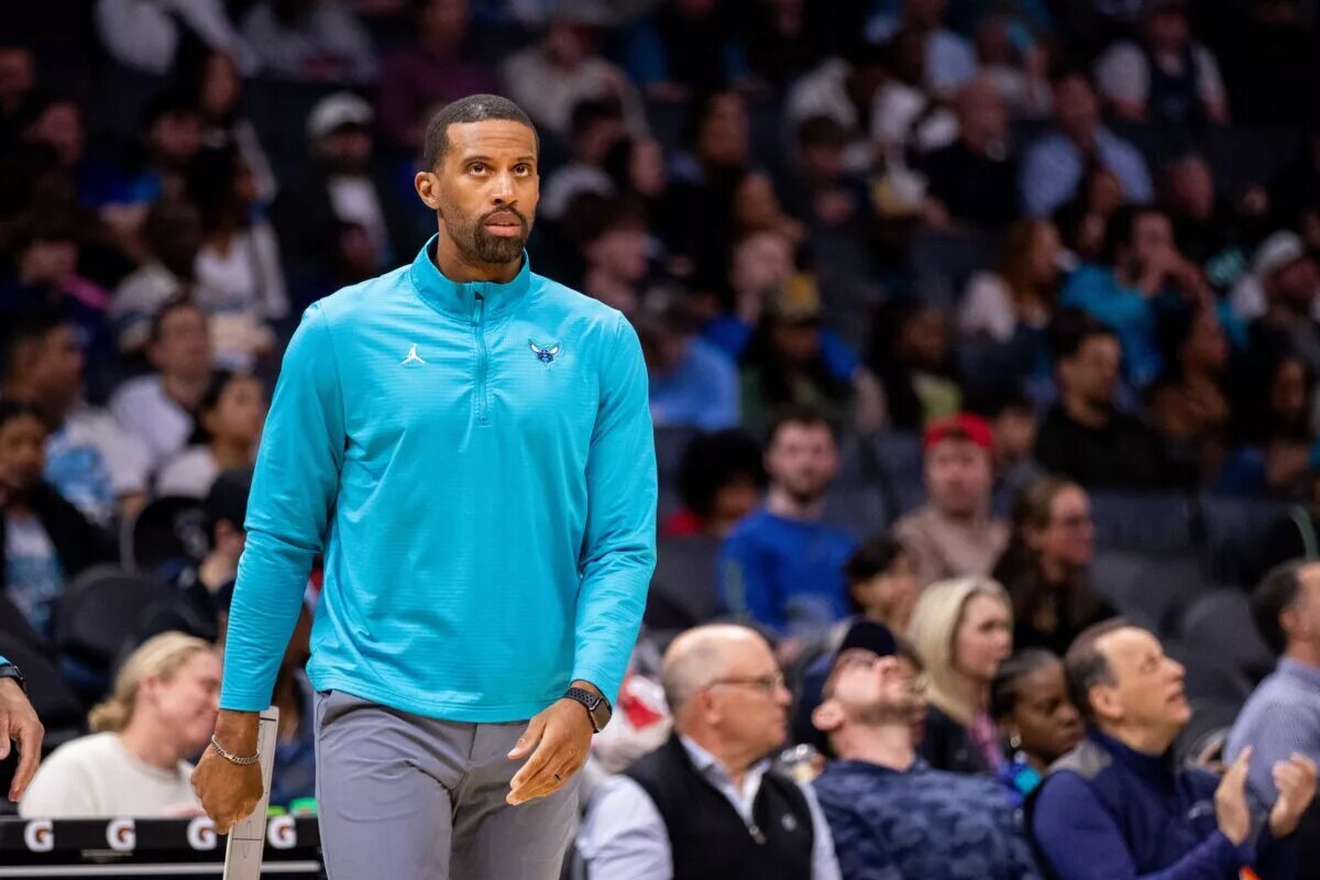 Mar 1, 2025; Charlotte, North Carolina, USA; Charlotte Hornets head coach Charles Lee walks out for a timeout during the second quarter against the Washington Wizards at Spectrum Center. Mandatory Credit: Scott Kinser-Imagn Images