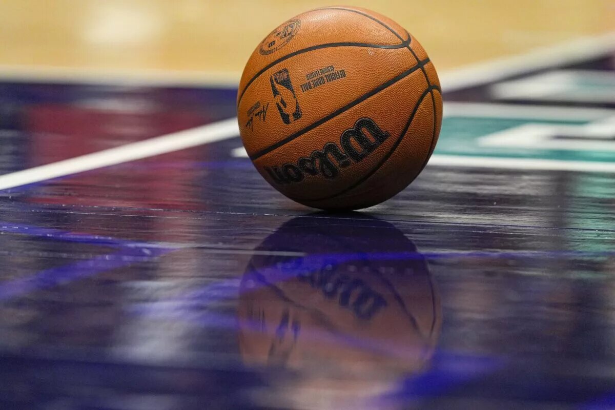 Mar 3, 2025; Charlotte, North Carolina, USA; NBA ball on the court during the second quarter between the Charlotte Hornets and the Golden State Warriors at Spectrum Center. Mandatory Credit: Jim Dedmon-Imagn Images LaMelo Ball