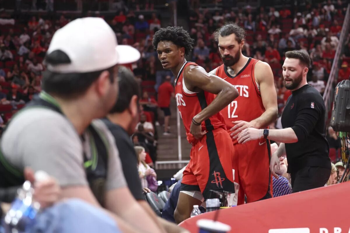 Houston Rockets playmaker Amen Thompson walks off court after ankle injury