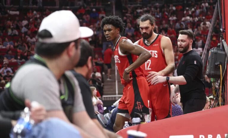Houston Rockets playmaker Amen Thompson walks off court after ankle injury