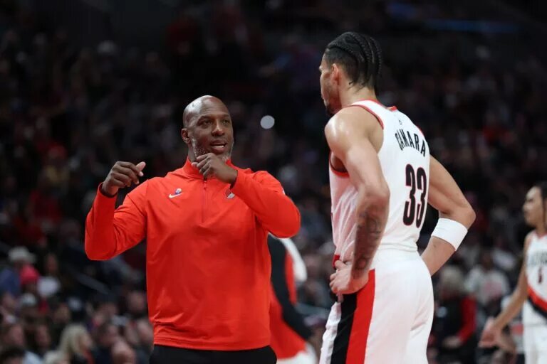 Mar 9, 2025; Portland, Oregon, USA; Portland Trail Blazers head coach Chauncey Billups talks with Trail BlazersÕ forward Toumani Camara (33) during a time out in the first half at Moda Center. Mandatory Credit: Jaime Valdez-Imagn Images