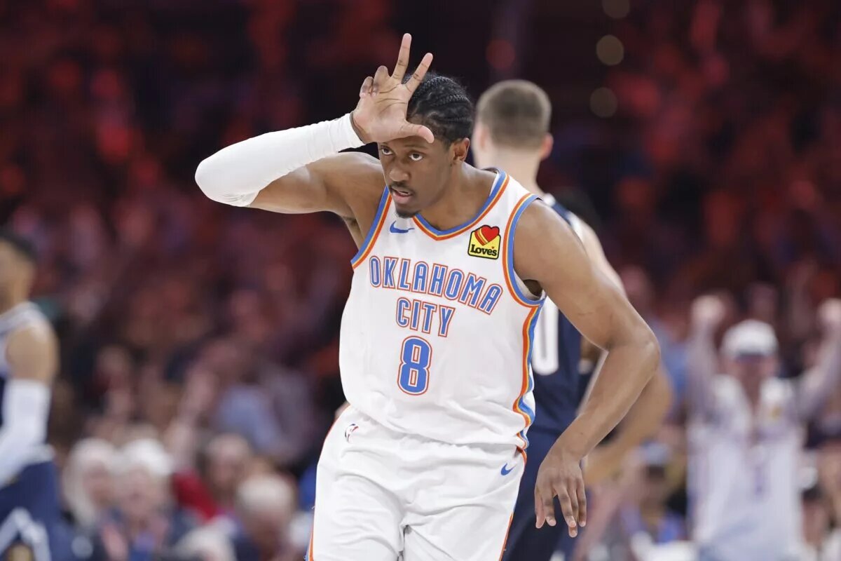 Mar 10, 2025; Oklahoma City, Oklahoma, USA; Oklahoma City Thunder forward Jalen Williams (8) gestures after scoring a three point basket against the Denver Nuggets during the second quarter at Paycom Center. Mandatory Credit: Alonzo Adams-Imagn Images