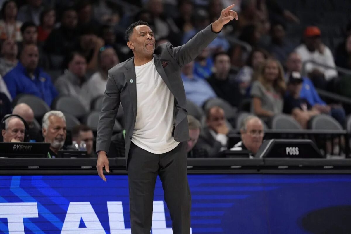 Mar 12, 2025; Charlotte, NC, USA; Virginia Cavaliers head coach Ron Sanchez signals to his team during the second half against the Virginia Cavaliers at Spectrum Center. Mandatory Credit: Jim Dedmon-Imagn Images