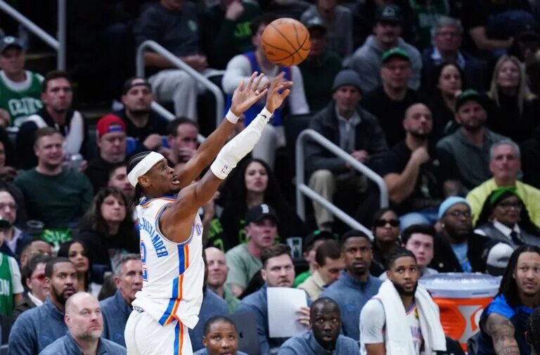 Mar 12, 2025; Boston, Massachusetts, USA; Oklahoma City Thunder guard Shai Gilgeous-Alexander (2) shoots the ball against the Boston Celtics in the fourth quarter at TD Garden. Mandatory Credit: David Butler II-Imagn Images