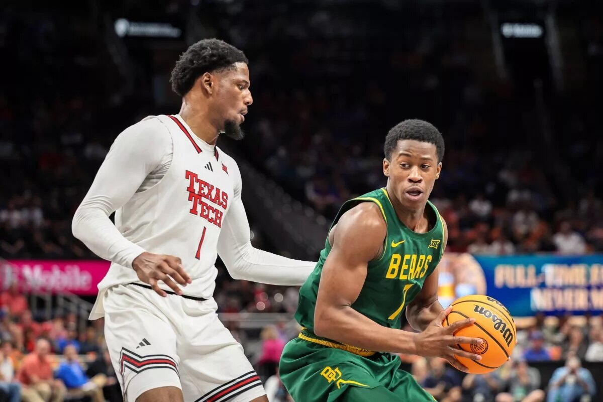 Mar 13, 2025; Kansas City, MO, USA; Baylor Bears guard VJ Edgecombe (7) drives to the basket around Texas Tech Red Raiders guard Kevin Overton (1) during the second half at T-Mobile Center. Mandatory Credit: William Purnell-Imagn Images