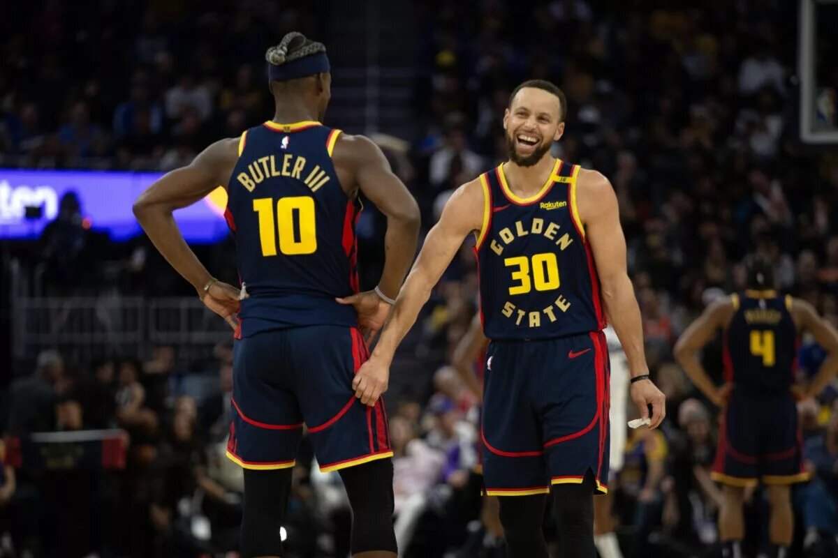 Golden State Warriors forward Jimmy Butler III (10) and guard Stephen Curry