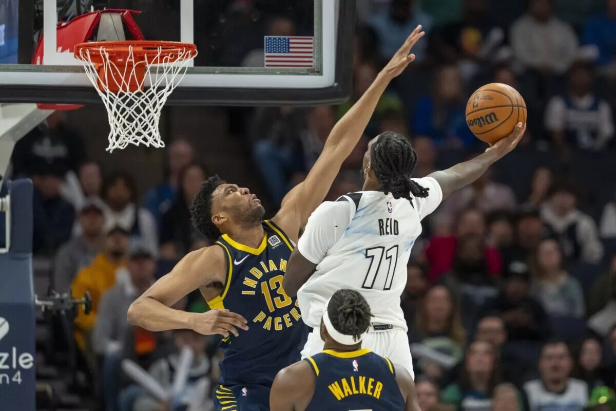 The Pacers converted Tony Bradley to a standard contract.