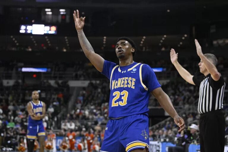 Mar 20, 2025; Providence, RI, USA; McNeese State Cowboys guard Brandon Murray (23) celebrates after a three point basket against the Clemson Tigers during the second half at Amica Mutual Pavilion. Mandatory Credit: Eric Canha-Imagn Images