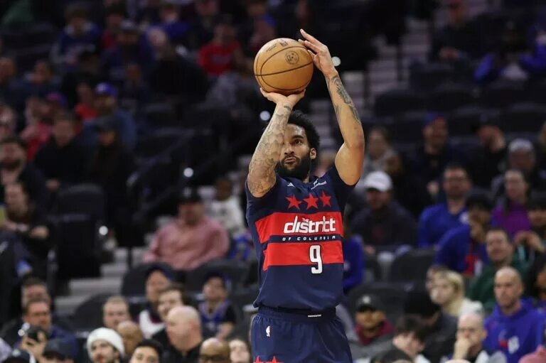 Mar 26, 2025; Philadelphia, Pennsylvania, USA; Washington Wizards forward Justin Champagnie (9) shoots the ball against the Philadelphia 76ers during the first quarter at Wells Fargo Center. Mandatory Credit: Bill Streicher-Imagn Images