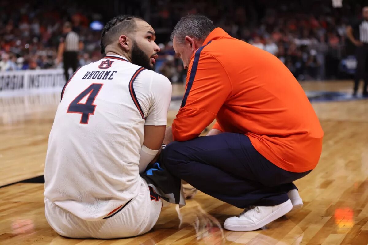 Johni Broome suffered an elbow injury.
