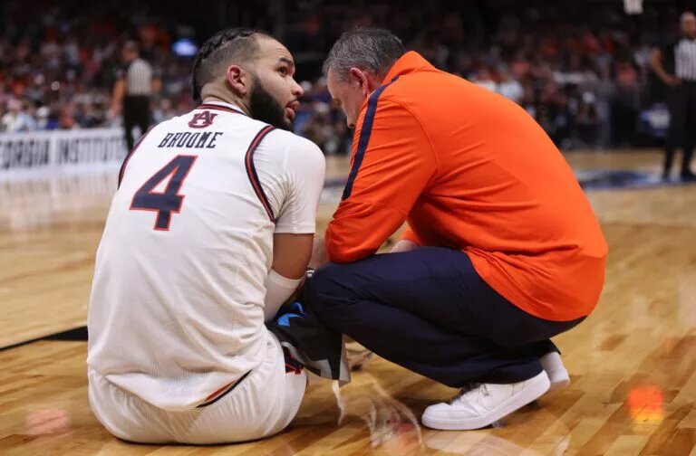 Johni Broome suffered an elbow injury.