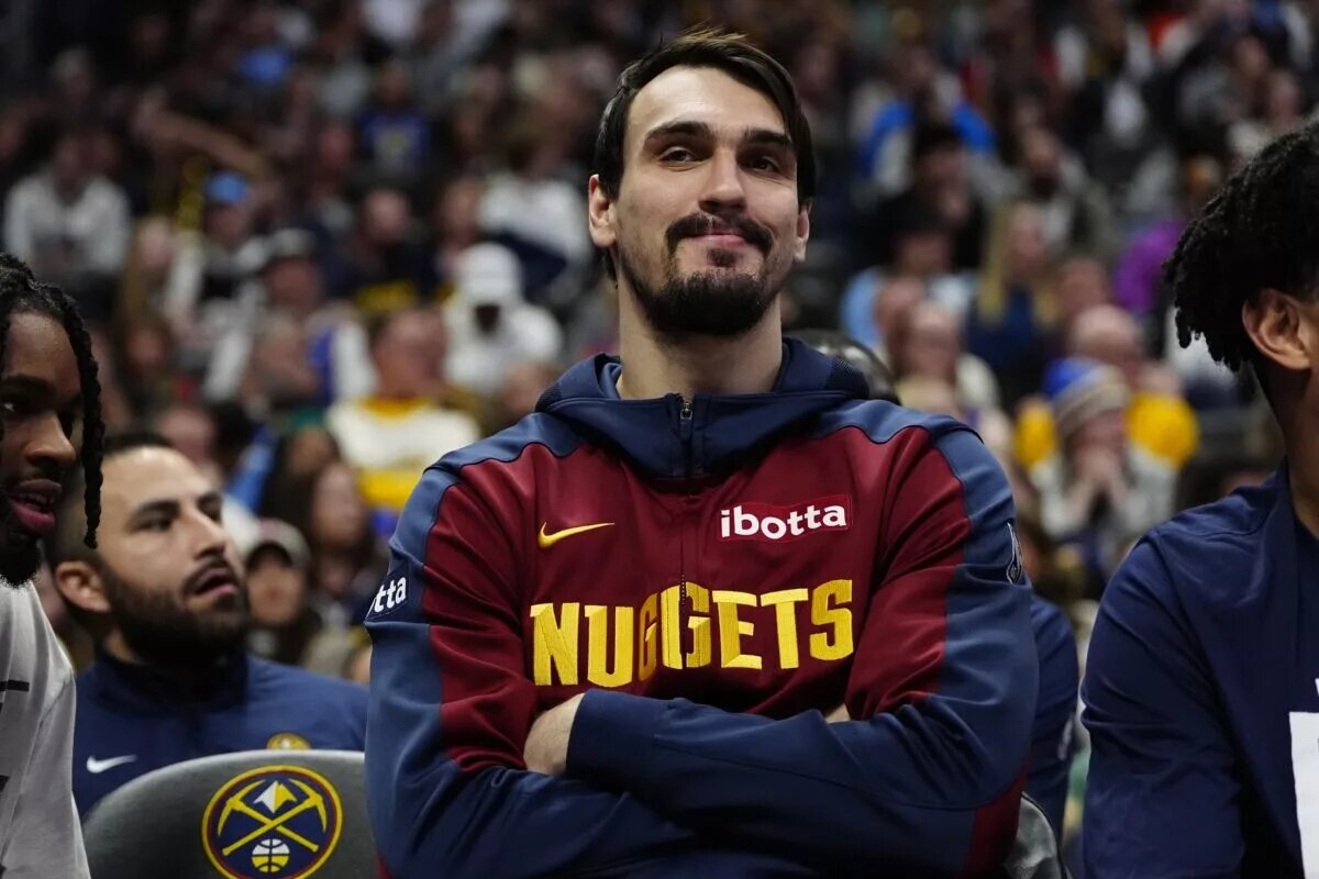 Feb 3, 2025; Denver, Colorado, USA; Denver Nuggets forward Dario Saric (9) on the bench in the second half against the New Orleans Pelicans at Ball Arena. Mandatory Credit: Ron Chenoy-Imagn Images