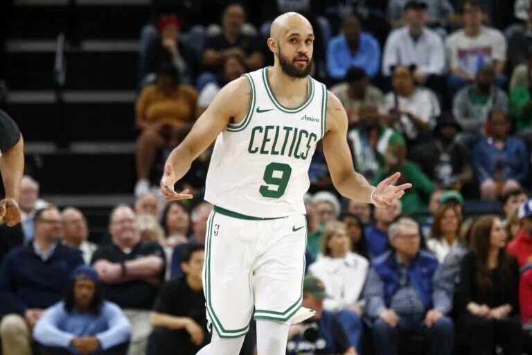 Boston Celtics guard Derrick White reacts to 3P basket
