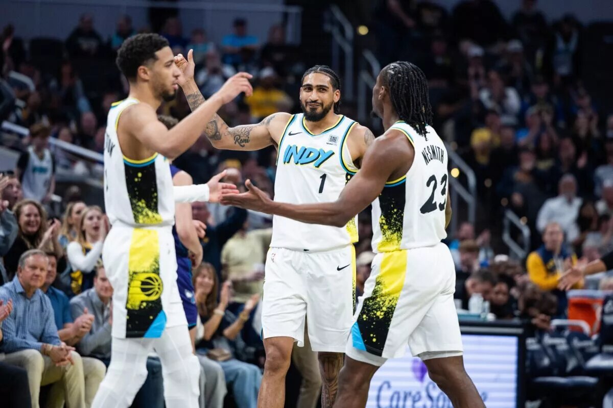 Indiana Pacers forward Obi Toppin (1) celebrates with guard Tyrese Haliburton