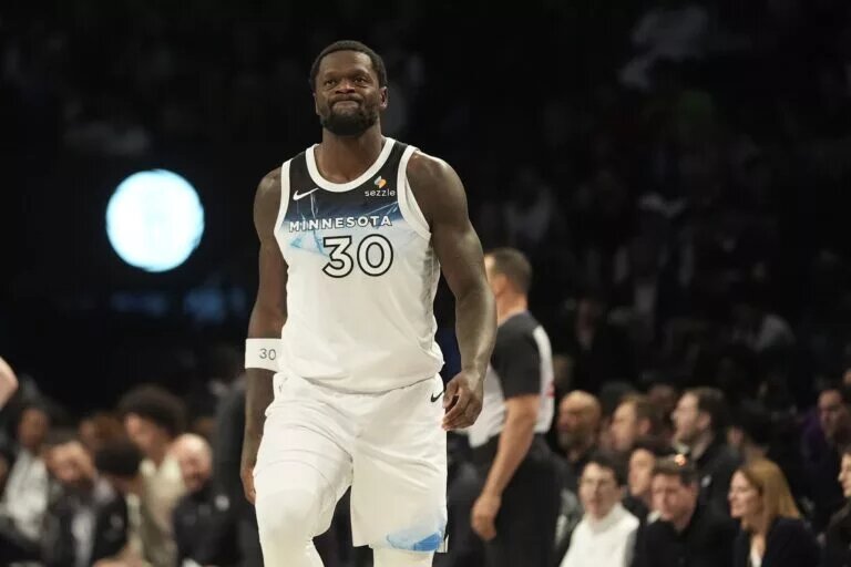 Apr 3, 2025; Brooklyn, New York, USA; Minnesota Timberwolves power forward Julius Randle (30) reacts to a play on the court against the Brooklyn Nets during the first half at Barclays Center. Mandatory Credit: Gregory Fisher-Imagn Images