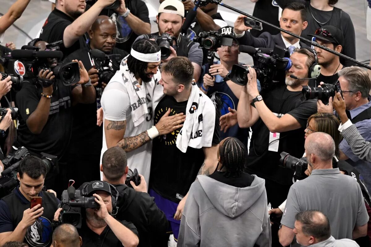 Apr 9, 2025; Dallas, Texas, USA; Dallas Mavericks forward Anthony Davis (3) talks with Los Angeles Lakers guard Luka Doncic (77) after the game at the American Airlines Center. Mandatory Credit: Jerome Miron-Imagn Images