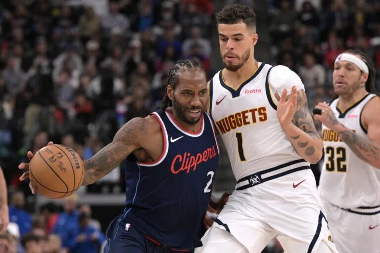 Denver Nuggets forward Michael Porter Jr. guards Los Angeles Clippers forward Kawhi Leonard