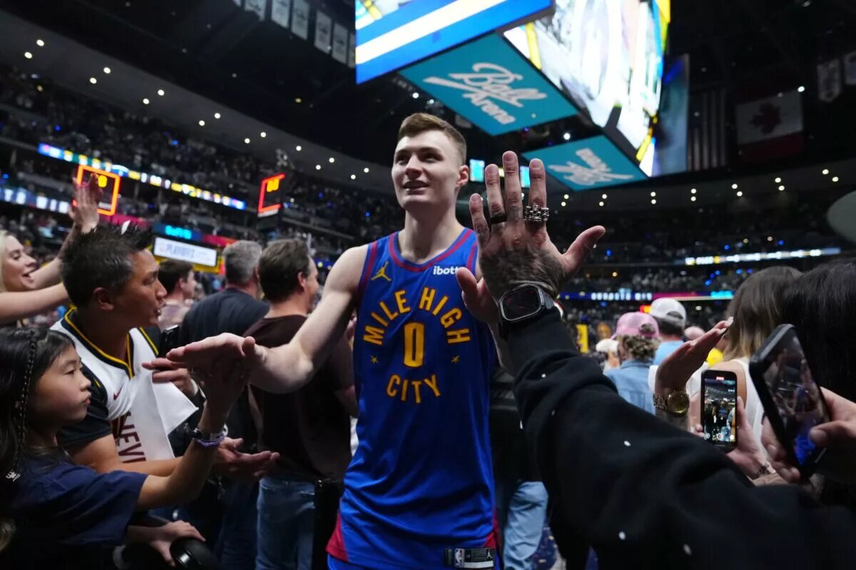 Denver Nuggets guard Christian Braun (0) celebrates the win over the LA Clippers following game seven of first round for the 2025 NBA Playoffs at Ball Arena.