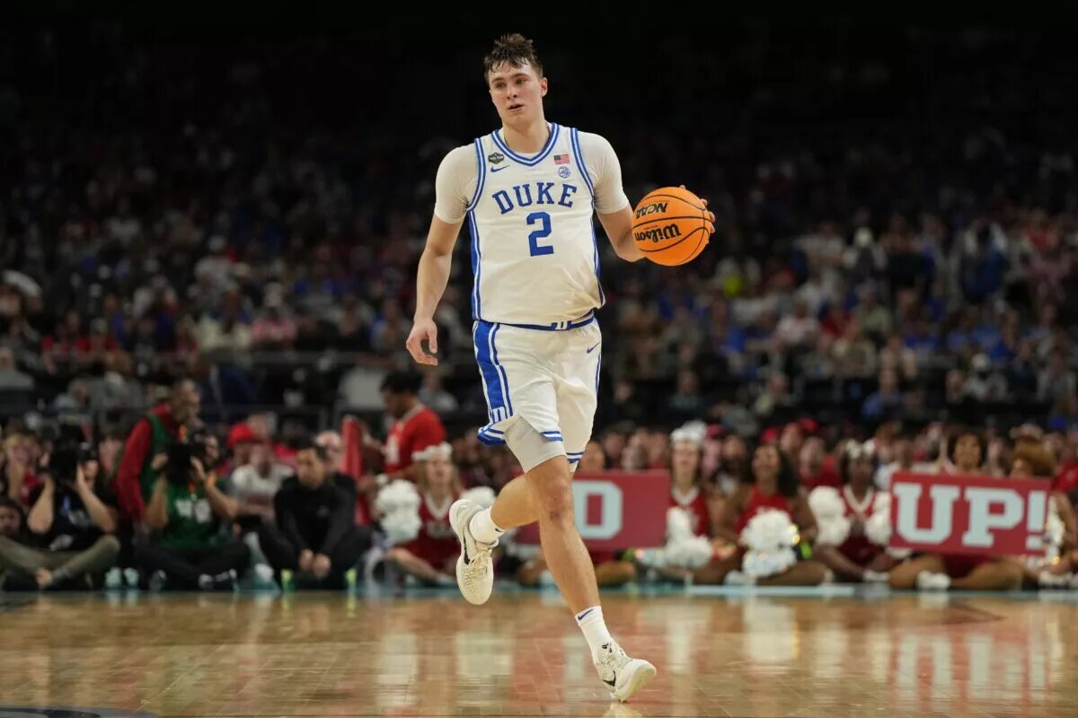 Duke freshman forward Cooper Flagg handles the ball up the court