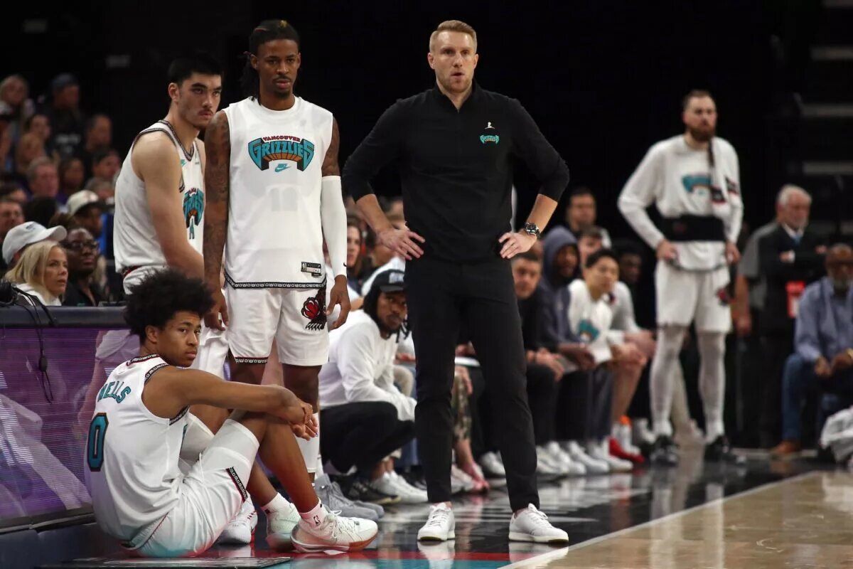 Memphis Grizzlies head coach Tuomas Iisalo, point guard Ja Morant, wing Jaylen Wells, and center Zach Edey