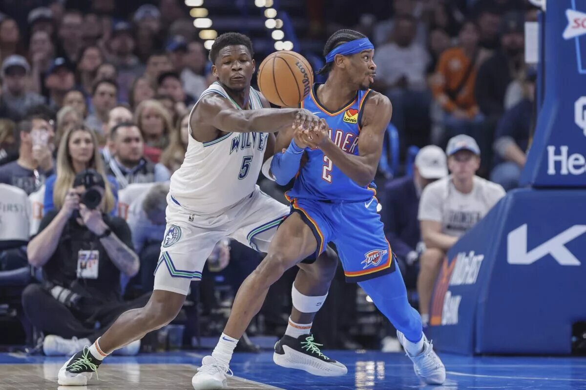 Jan 29, 2024; Oklahoma City, Oklahoma, USA; Minnesota Timberwolves guard Anthony Edwards (5) forces a turn over by Oklahoma City Thunder guard Shai Gilgeous-Alexander (2) during the second quarter at Paycom Center. Mandatory Credit: Alonzo Adams-USA TODAY Sports