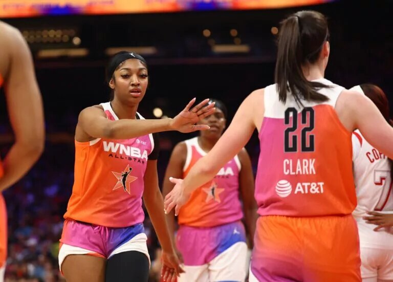 eam WNBA guard Caitlin Clark (22) and Angel Reese against the USA Women's National Team during the 2024 WNBA All Star Game at Footprint Center.