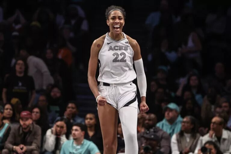 Las Vegas Aces center A'ja Wilson (22) celebrates after scoring in the fourth quarter against the New York Liberty during game two of the 2024 WNBA Semi-finals at Barclays Center.
