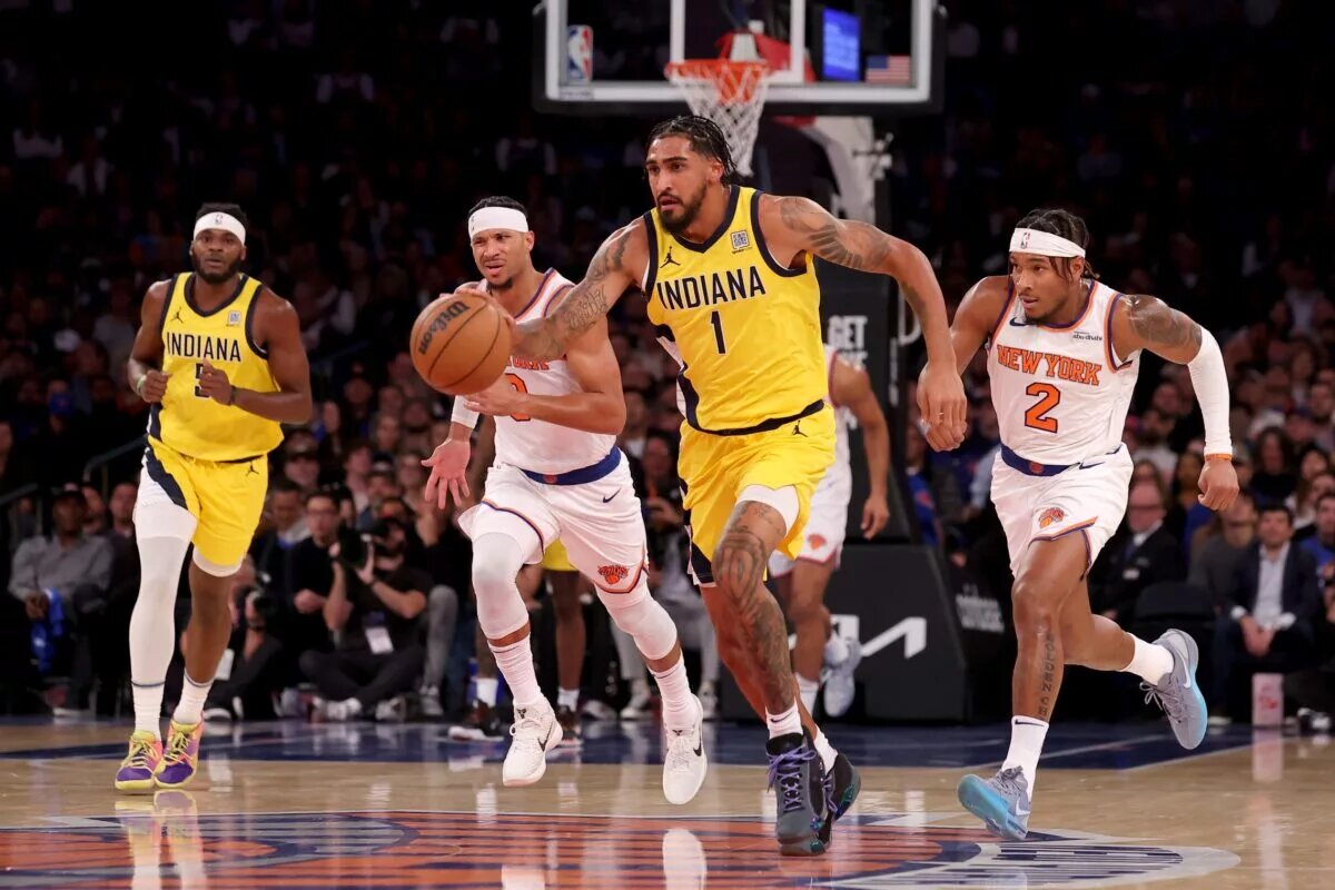 Oct 25, 2024; New York, New York, USA; Indiana Pacers forward Obi Toppin (1) brings the ball up court against New York Knicks guards Josh Hart (3) and Miles McBride (2) during the second quarter at Madison Square Garden. Mandatory Credit: Brad Penner-Imagn Images