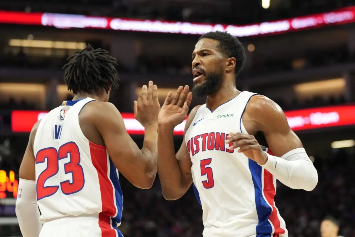 Dec 26, 2024; Sacramento, California, USA; Detroit Pistons guard Malik Beasley (5) high fives guard Jaden Ivey (23) after a play against the Sacramento Kings during the third quarter at Golden 1 Center. Mandatory Credit: Kelley L Cox-Imagn Images