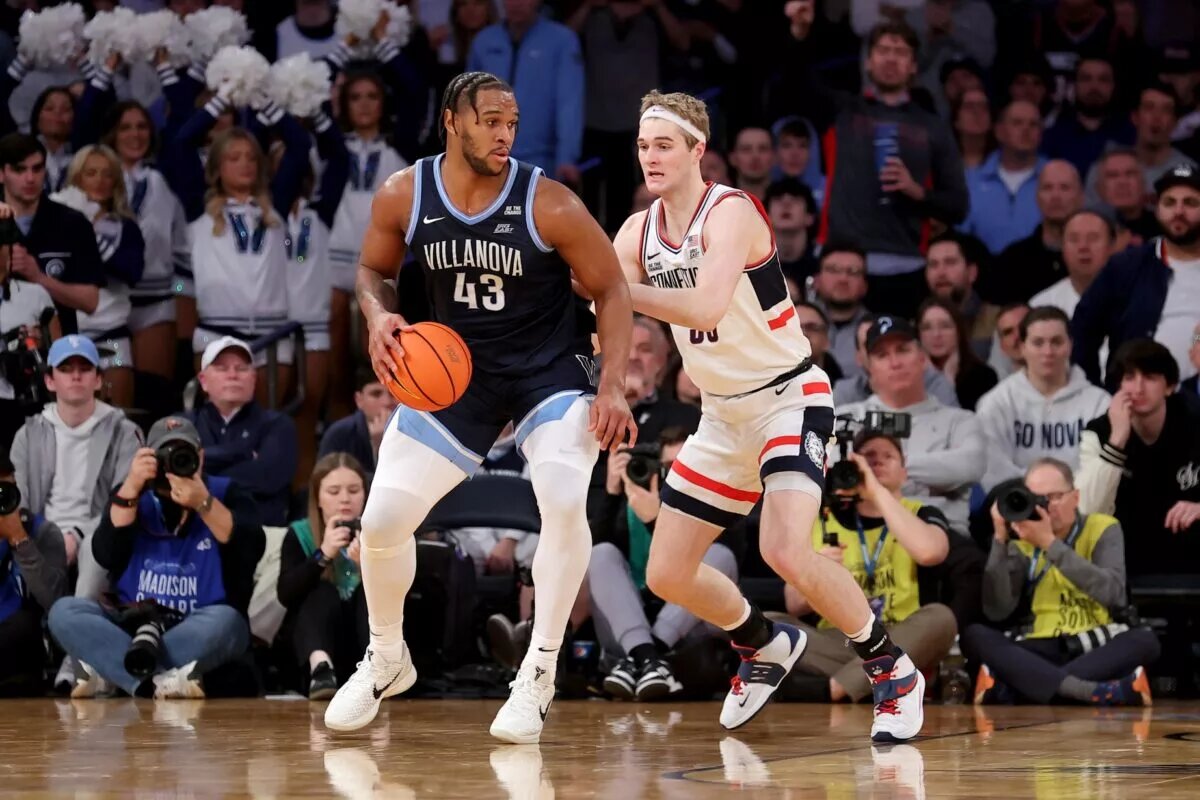 Mar 13, 2025; New York, NY, USA; Villanova Wildcats forward Eric Dixon (43) controls the ball against Connecticut Huskies forward Liam McNeeley (30) during the second half at Madison Square Garden. Mandatory Credit: Brad Penner-Imagn Images