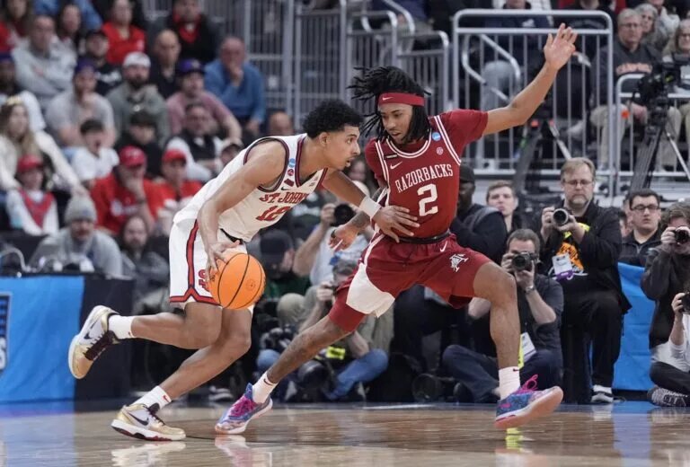 2025 NBA Draft prospect RJ Luis guarded by Boogie Fland