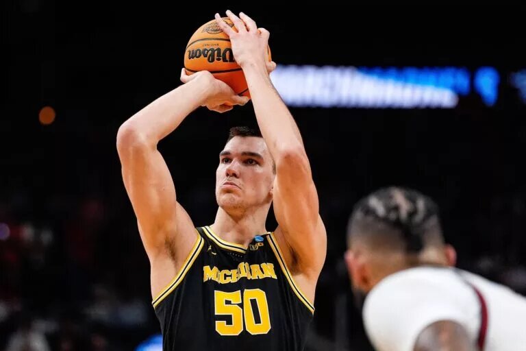 Michigan center Vladislav Goldin (50) attempts a free throw against Auburn during the second half of the Sweet 16 round of NCAA tournament at State Farm Arena in Atlanta, Ga. on Friday, March 28, 2025.