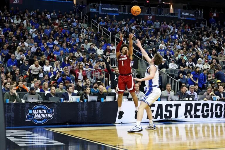 Mar 29, 2025; Newark, NJ, USA; Alabama Crimson Tide guard Mark Sears (1) shoots the ball against Duke Blue Devils guard Kon Knueppel (7) during the first half in the East Regional final of the 2025 NCAA tournament at Prudential Center. Mandatory Credit: Vincent Carchietta-Imagn Images