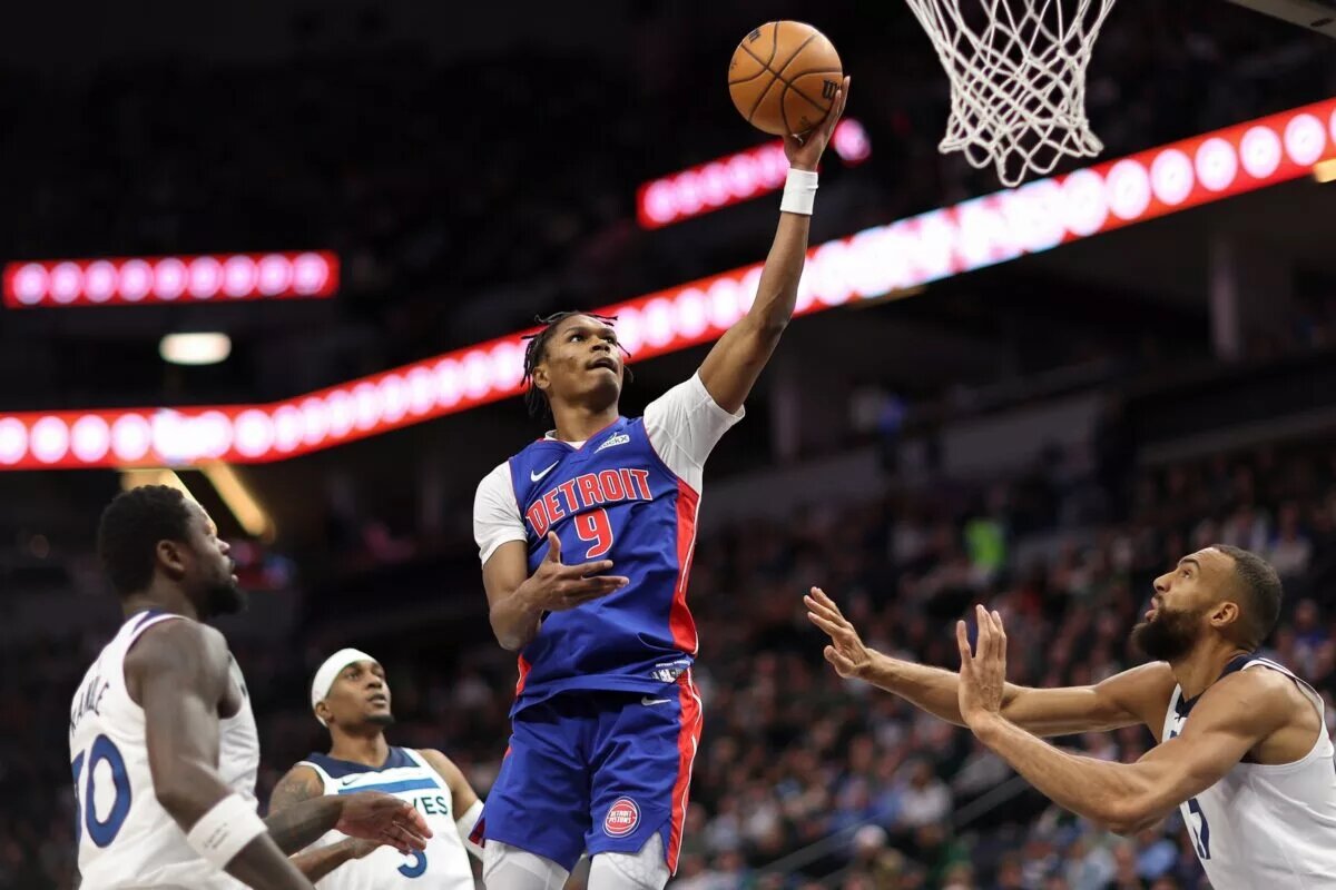 Detroit Pistons forward Ausar Thompson (9) shoots the ball against the Minnesota Timberwolves during the first quarter at Target Center.