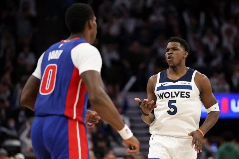 Mar 30, 2025; Minneapolis, Minnesota, USA; Minnesota Timberwolves guard Anthony Edwards (5) celebrates his 3-point basket against the Detroit Pistons during the third quarter at Target Center. Mandatory Credit: Matt Krohn-Imagn Images