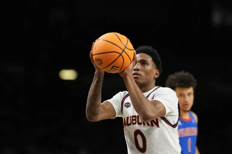 Apr 5, 2025; San Antonio, TX, USA; Auburn Tigers guard Tahaad Pettiford (0) shoots a free throw against the Florida Gators during the first half in the semifinals of the men's Final Four of the 2025 NCAA Tournament at the Alamodome. Mandatory Credit: Bob Donnan-Imagn Images