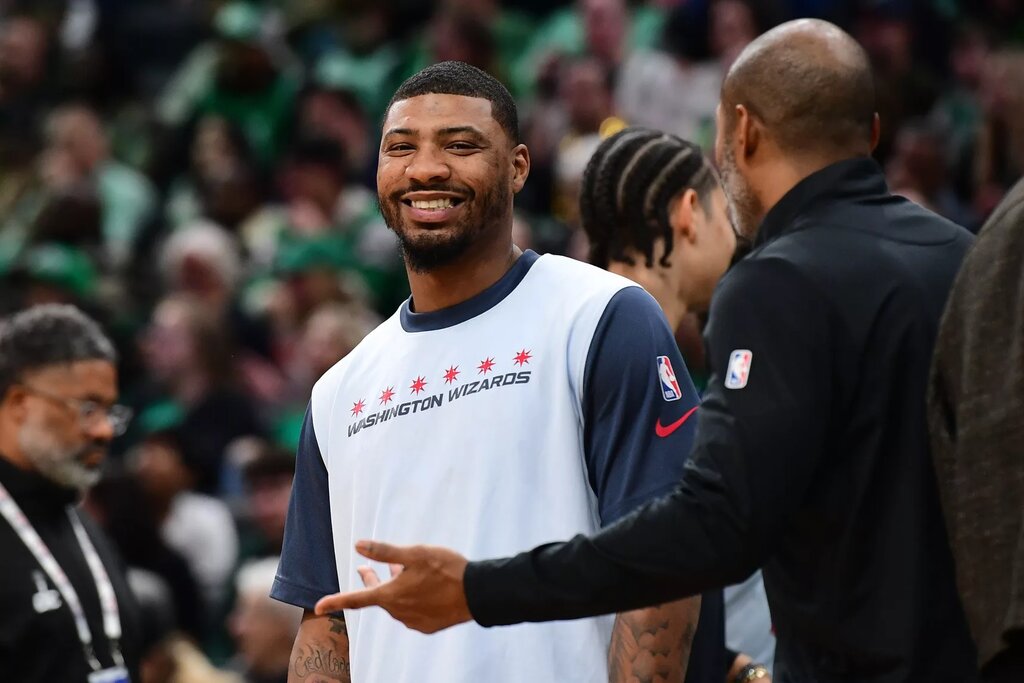 Washington Wizards guard Marcus Smart (36) smiles during a timeout in the first half again the Boston Celtics at TD Garden.