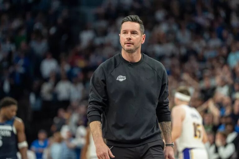 Apr 27, 2025; Minneapolis, Minnesota, USA; Los Angeles Lakers head coach JJ Redick reacts to his team losing the lead to the Minnesota Timberwolves late in the fourth quarter during game four of first round for the 2025 NBA Playoffs at Target Center. Mandatory Credit: Matt Blewett-Imagn Images