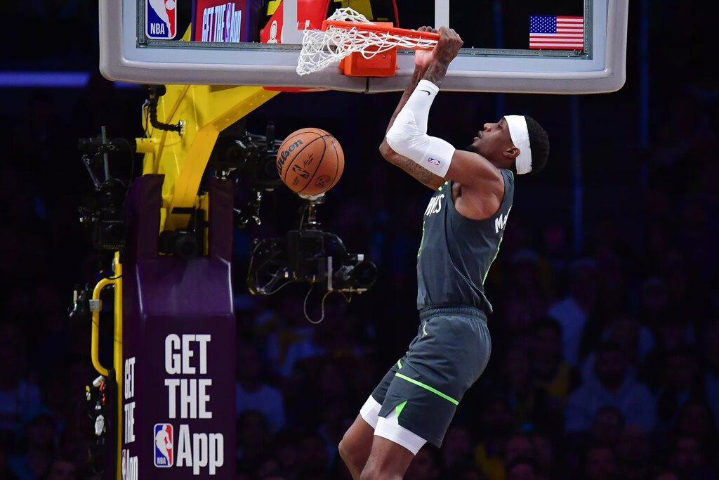 Apr 30, 2025; Los Angeles, California, USA; Minnesota Timberwolves guard Nickeil Alexander-Walker (9) dunks for the basket against the Los Angeles Lakers during the first half in game five of first round for the 2025 NBA Playoffs at Crypto.com Arena. Mandatory Credit: Gary A. Vasquez-Imagn Images
