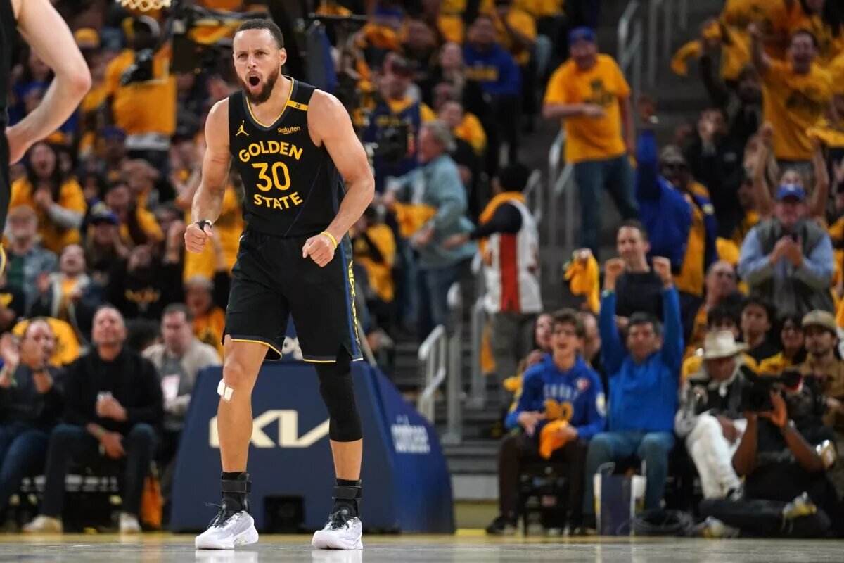 Golden State Warriors guard Stephen Curry (30) reacts after making a three-point basket against the Houston Rockets in the third quarter of game six of the first round for the 2025 NBA Playoffs at Chase Center.