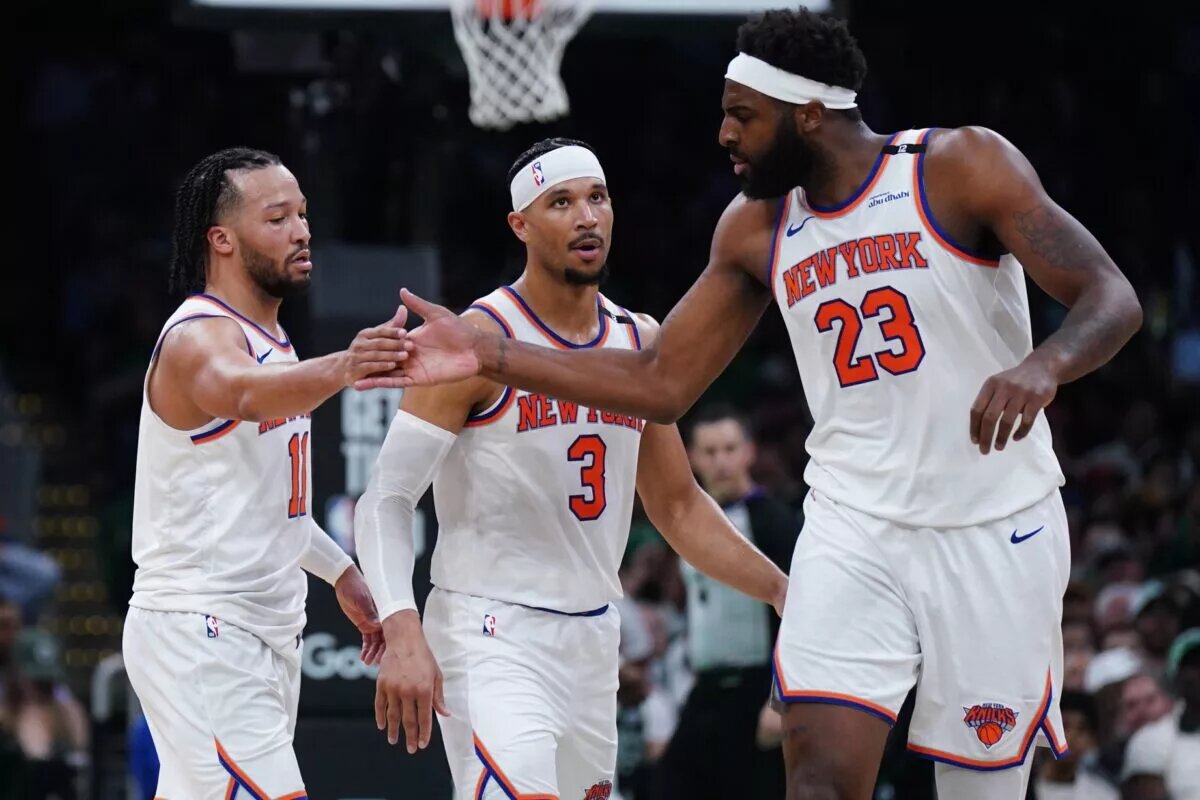 May 7, 2025; Boston, Massachusetts, USA; New York Knicks guard Jalen Brunson (11) and center Mitchell Robinson (23) react after a play against the Boston Celtics in the second half during game two of the second round for the 2025 NBA Playoffs at TD Garden. Mandatory Credit: David Butler II-Imagn Images