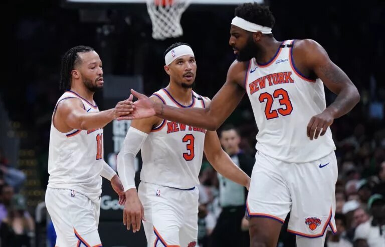 May 7, 2025; Boston, Massachusetts, USA; New York Knicks guard Jalen Brunson (11) and center Mitchell Robinson (23) react after a play against the Boston Celtics in the second half during game two of the second round for the 2025 NBA Playoffs at TD Garden. Mandatory Credit: David Butler II-Imagn Images