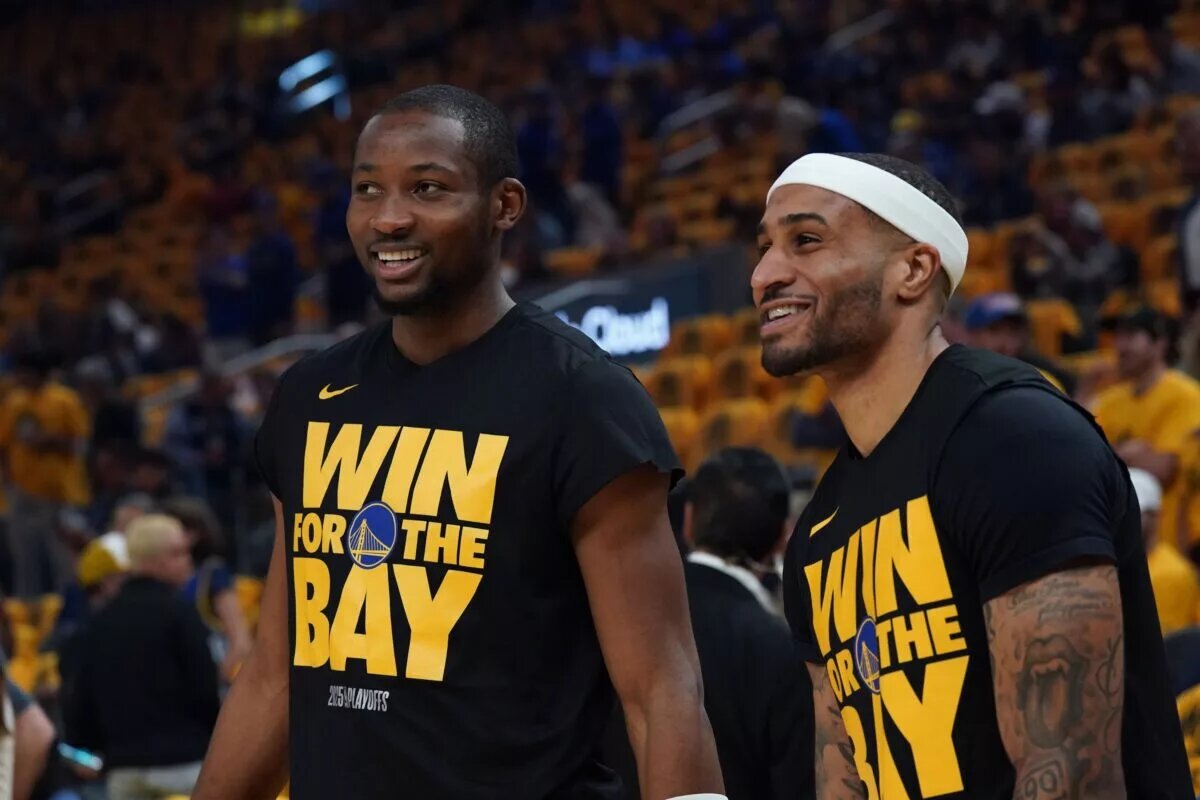 Golden State Warriors forward Jonathan Kuminga (00) and guard Gary Payton II