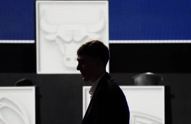 May 12, 2025; Chicago, Illinois, US; Cooper Flagg walks to his seat during the 2025 NBA Draft Lottery at McCormick Place. Mandatory Credit: David Banks-Imagn Images