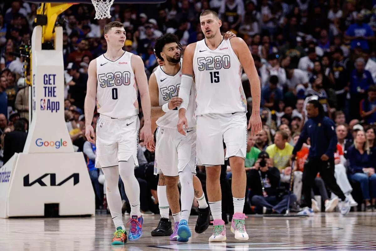 Denver Nuggets guard Jamal Murray (27) and center Nikola Jokic (15) and guard Christian Braun